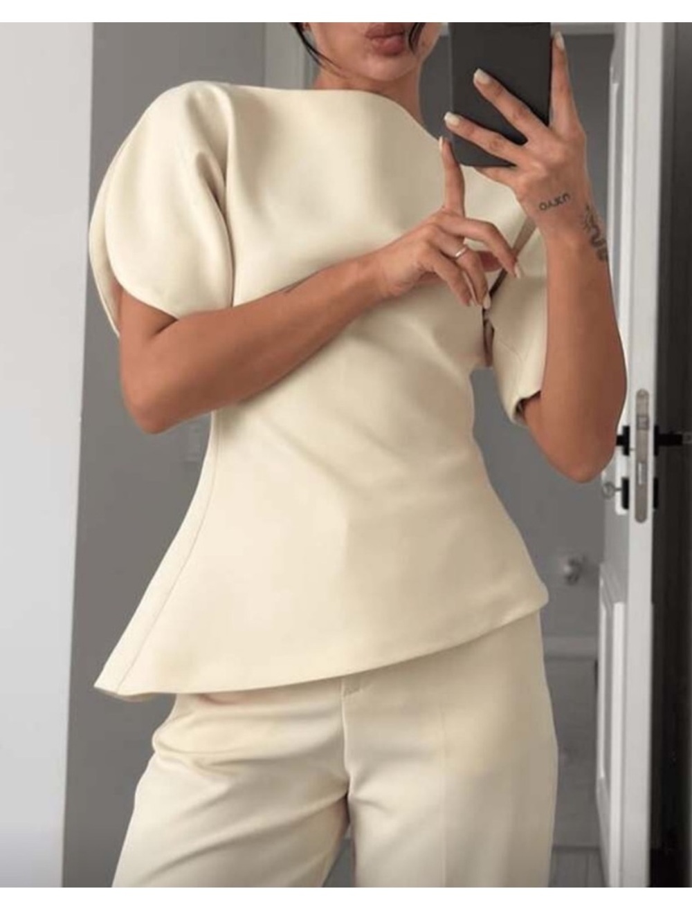 Fully lined thick material Ivory off white Structured asymmetric puff sleeve Top